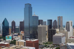 Caption: Stunning Sunset View Of The Dallas Skyline Wallpaper