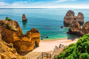 Caption: Stunning View Of Portuguese Beach Wallpaper