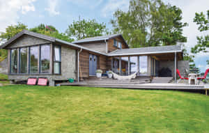 Caption: Stunning View Of Sandefjord Coastline Wallpaper