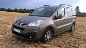 Caption: Stylish Citroen Berlingo On The Open Road Wallpaper