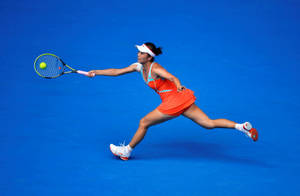 Caption: Tennis Professional Shuai Peng In Action Wallpaper