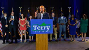 Caption: Terry Mcauliffe Speaking Out Loud Wallpaper