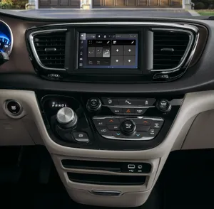 Caption: The Classy Chrysler Voyager On A Mesmerizing Night Drive Wallpaper