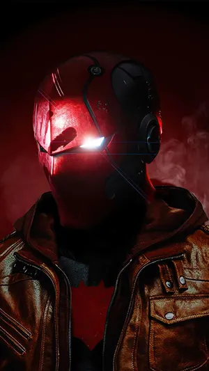 Caption: The Dark Knight Faces The Red Hood In An Iconic Confrontation Wallpaper