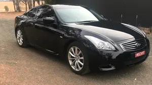 Caption: The Luxurious Infiniti G37 Gliding On The Highway Wallpaper