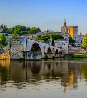 Caption: The Majestic Cityscape Of Avignon, France Wallpaper