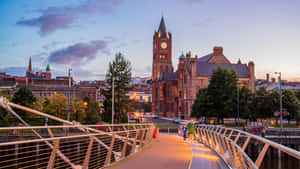 Caption: The Peaceful River Foyle Flowing Through Londonderry. Wallpaper