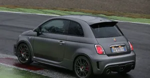 Caption: The Sleek And Sporty Abarth 695 Wallpaper