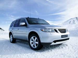 Caption: The Sleek And Stylish Saab 9-7x In Action Wallpaper