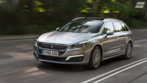 Caption: The Sleek Design Of The Peugeot 508 Wallpaper