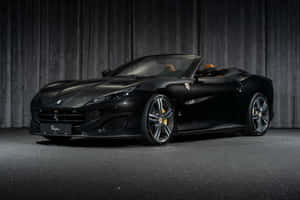 Caption: The Stunning Ferrari Portofino Showcasing Its Elegance And Power On The Open Road. Wallpaper