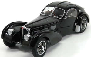 Caption: Timeless Elegance Of The Bugatti Type 57sc Atlantic Wallpaper