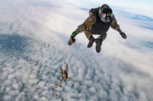 Caption: Top Of The Clouds Skydiving Wallpaper