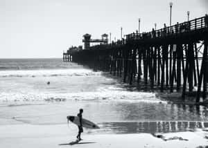 Caption: Tranquil Black And White Beach Wallpaper