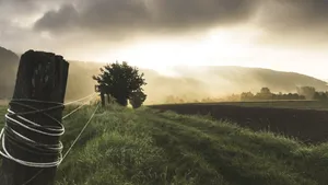 Caption: Tranquil Majesty Of Rural Landscapes Wallpaper