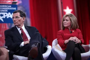 Caption: U.s. Senators John Barrasso And Marsha Blackburn In Discussion Wallpaper