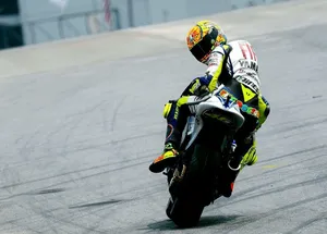 Caption: Valentino Rossi At 2015 Malaysia Grand Prix Wallpaper