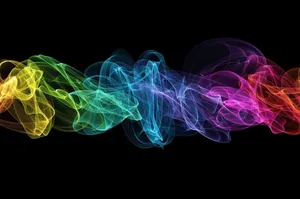 Caption: Vibrant Display Of The Color Spectrum In A Swirl Design Wallpaper