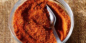 Caption: Vibrant Red Chili Powder Wallpaper
