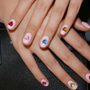 Caption: Vibrant Spring Nails With Floral Design Wallpaper