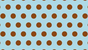 Caption: Vintage Brown Polka Dot Pattern Wallpaper