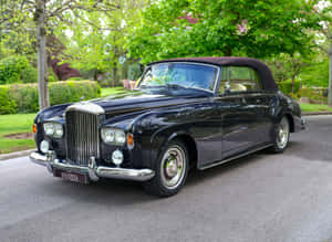 Caption: Vintage Elegance - Bentley S3 In Pristine Condition Wallpaper