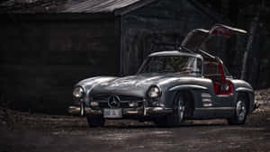 Caption: Vintage Elegance With The Old Mercedes-benz Gullwing. Wallpaper