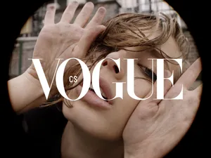 Caption: Vogue's Iconic Logo Represented In Artistic Monochrome Wallpaper