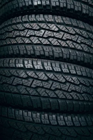 Caption: Winter Tires On Snowy Road Wallpaper