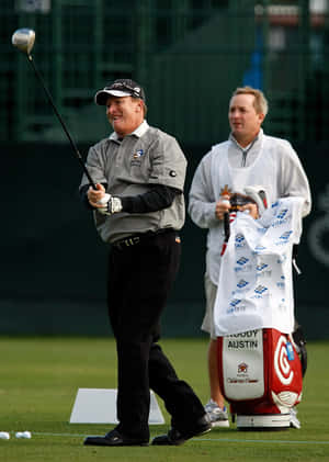 Caption: Woody Austin Perfecting His Swing Before A Match Wallpaper