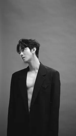 Captivating Ahn Hyo-seop In Stylish Long Coat Wallpaper