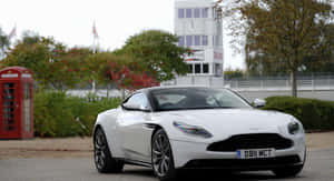 Captivating Aston Martin Db11 In Motion Wallpaper