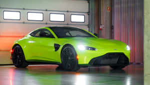 Captivating Aston Martin Vantage In Action Wallpaper