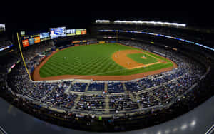 Captivating Baseball Stadium At Dusk Wallpaper