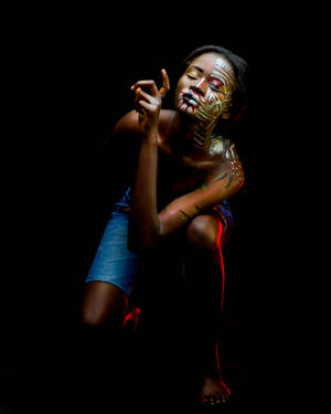 Captivating Beauty Of A Black Woman In Body Paint Wallpaper