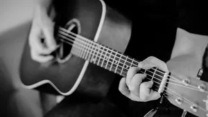 Captivating Black And White Guitar Wallpaper Wallpaper