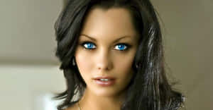 Captivating Blue Eyes Portrait Wallpaper