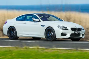 Captivating Bmw 6 Series Coupe In Motion Wallpaper