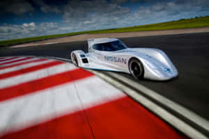 Captivating Car Racing On The Track Wallpaper