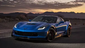 Captivating Chevrolet Corvette Grand Sport In Action Wallpaper