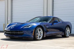 Captivating Chevrolet Corvette Stingray In Action Wallpaper