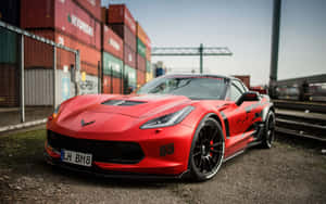 Captivating Chevrolet Corvette Z06 On The Road Wallpaper