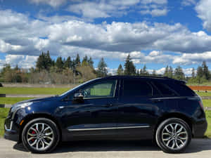 Captivating Display Of A Striking Cadillac Xt5 Wallpaper