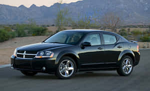 Captivating Dodge Avenger In Motion Wallpaper