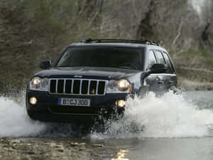 Captivating Elegance: The Grandeur Of Jeep Grand Cherokee Wallpaper