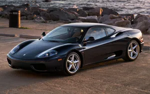 Captivating Ferrari 360 Modena In Action Wallpaper