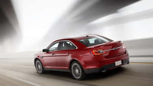 Captivating Ford Taurus In Action Wallpaper