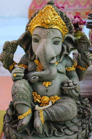 Captivating Ganesh Ji Hd Clay Statue Wallpaper