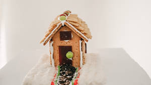 Captivating Gingerbread House Design Wallpaper