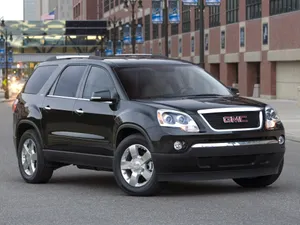 Captivating Gmc Acadia In The Wilderness Wallpaper